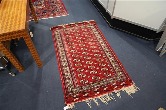 A Bokhara rug, 5ft 3in by 3ft 1in.